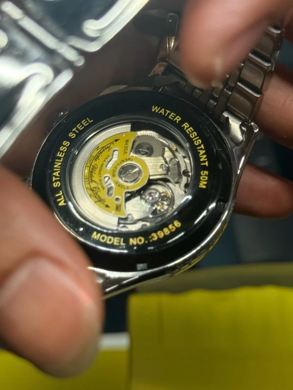 Invicta Stainless Steel Watch with Yellow Accented Rotor